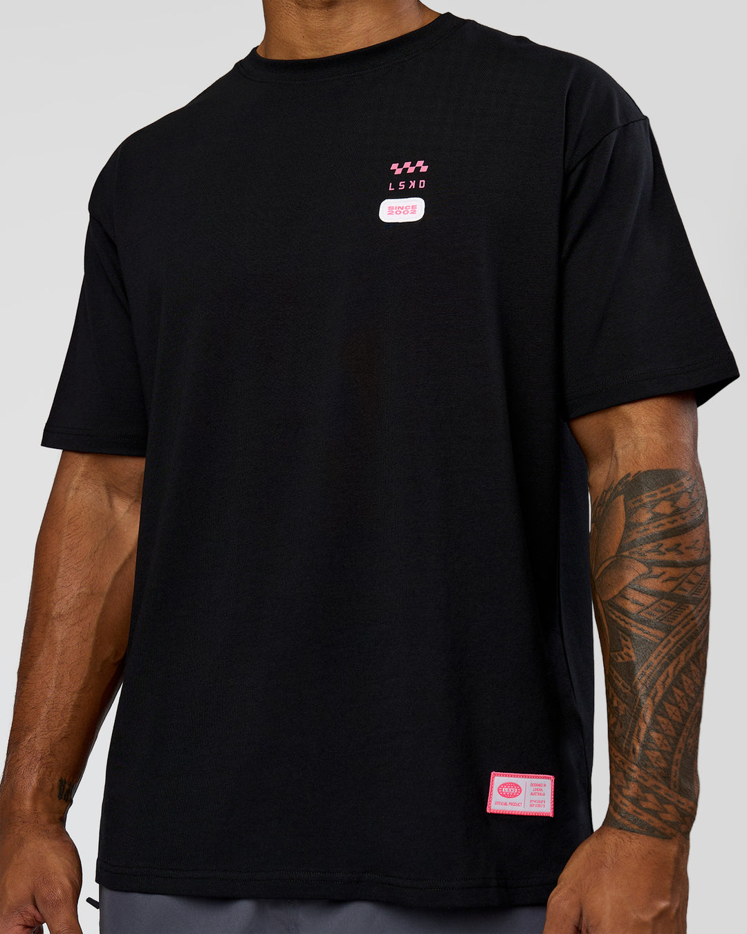 Man wearing Archive FLXCotton Oversized Tee - Black-Candy Pink | Model:Xav | Size:L - view 8