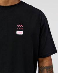 Man wearing Archive FLXCotton Oversized Tee - Black-Candy Pink | Model:Xav | Size:L | Thumbnail Index: 10