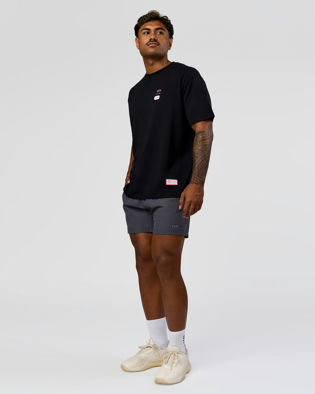 Man wearing Archive FLXCotton Oversized Tee - Black-Candy Pink | Model:Xav | Size:L - view 15