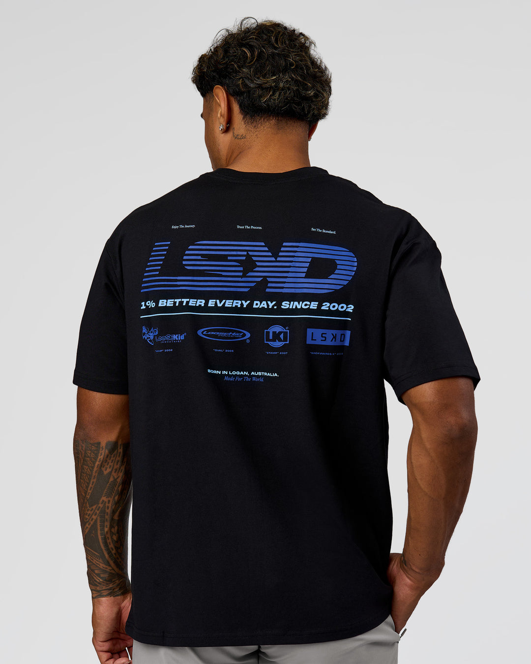 Man wearing Archive FLXCotton Oversized Tee - Black-Electric Indigo | Model:Xav | Size:L - view 2