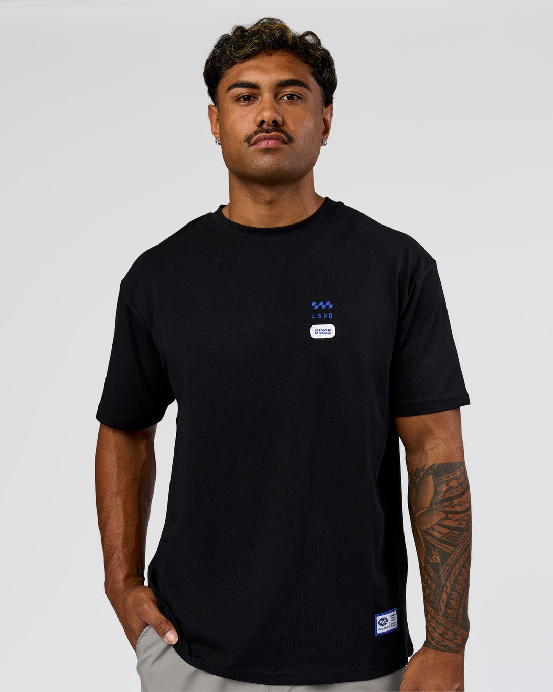 Man wearing Archive FLXCotton Oversized Tee - Black-Electric Indigo | Model:Xav | Size:L - view 8