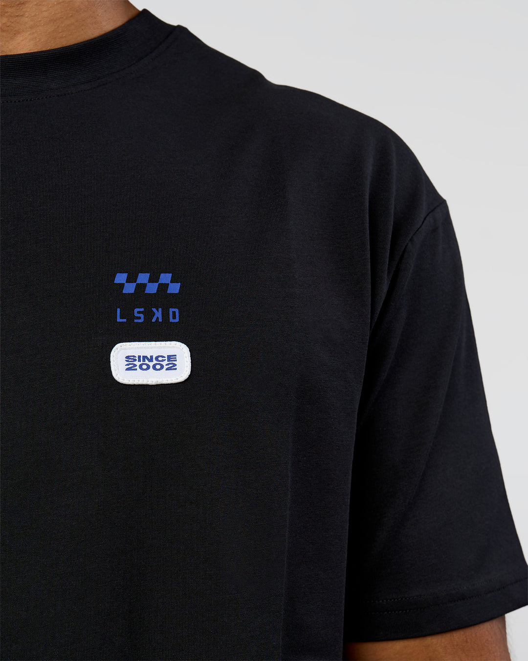 Man wearing Archive FLXCotton Oversized Tee - Black-Electric Indigo | Model:Xav | Size:L - view 10