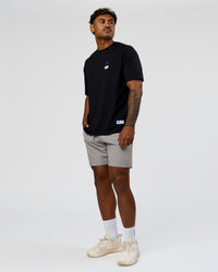 Man wearing Archive FLXCotton Oversized Tee - Black-Electric Indigo | Model:Xav | Size:L | Thumbnail Index: 13