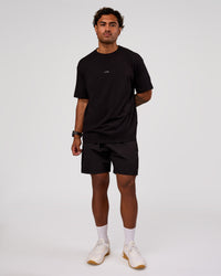 Man wearing Base FLXCotton Tee Oversized - Black | Model:Xav | Size:L | Thumbnail Index: 3
