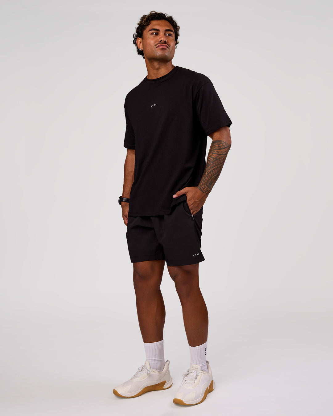 Man wearing Base FLXCotton Tee Oversized - Black | Model:Xav | Size:L - view 5