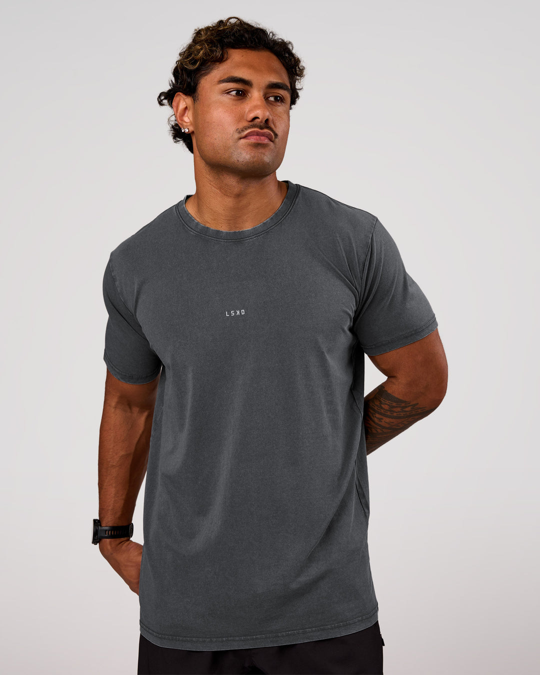 Man wearing Base FLXCotton Tee Oversized - Dark Storm Washed | Model:Xav | Size:L - view 1