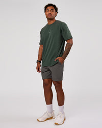Man wearing Base FLXCotton Tee Oversized - Midnight Green Washed | Model:Xav | Size:L | Thumbnail Index: 4