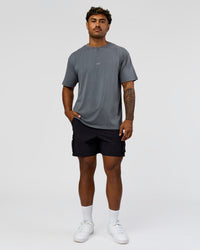 Man wearing Built On Values FLXCotton Oversized Tee - Dark Storm Washed-Pink Rose | Model:Xav | Size:L | Thumbnail Index: 4