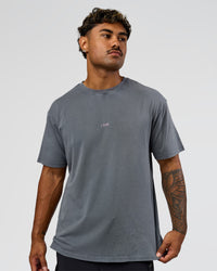 Man wearing Built On Values FLXCotton Oversized Tee - Dark Storm Washed-Pink Rose | Model:Xav | Size:L | Thumbnail Index: 8