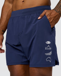Man wearing Greatest of All Time Functional Training 7" Short - Future Navy-White | Model:Xav | Size:L | Thumbnail Index: 2