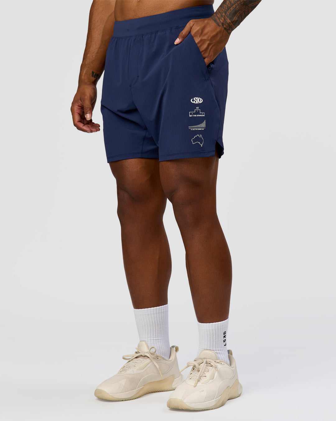 Man wearing Greatest of All Time Functional Training 7" Short - Future Navy-White | Model:Xav | Size:L - view 7