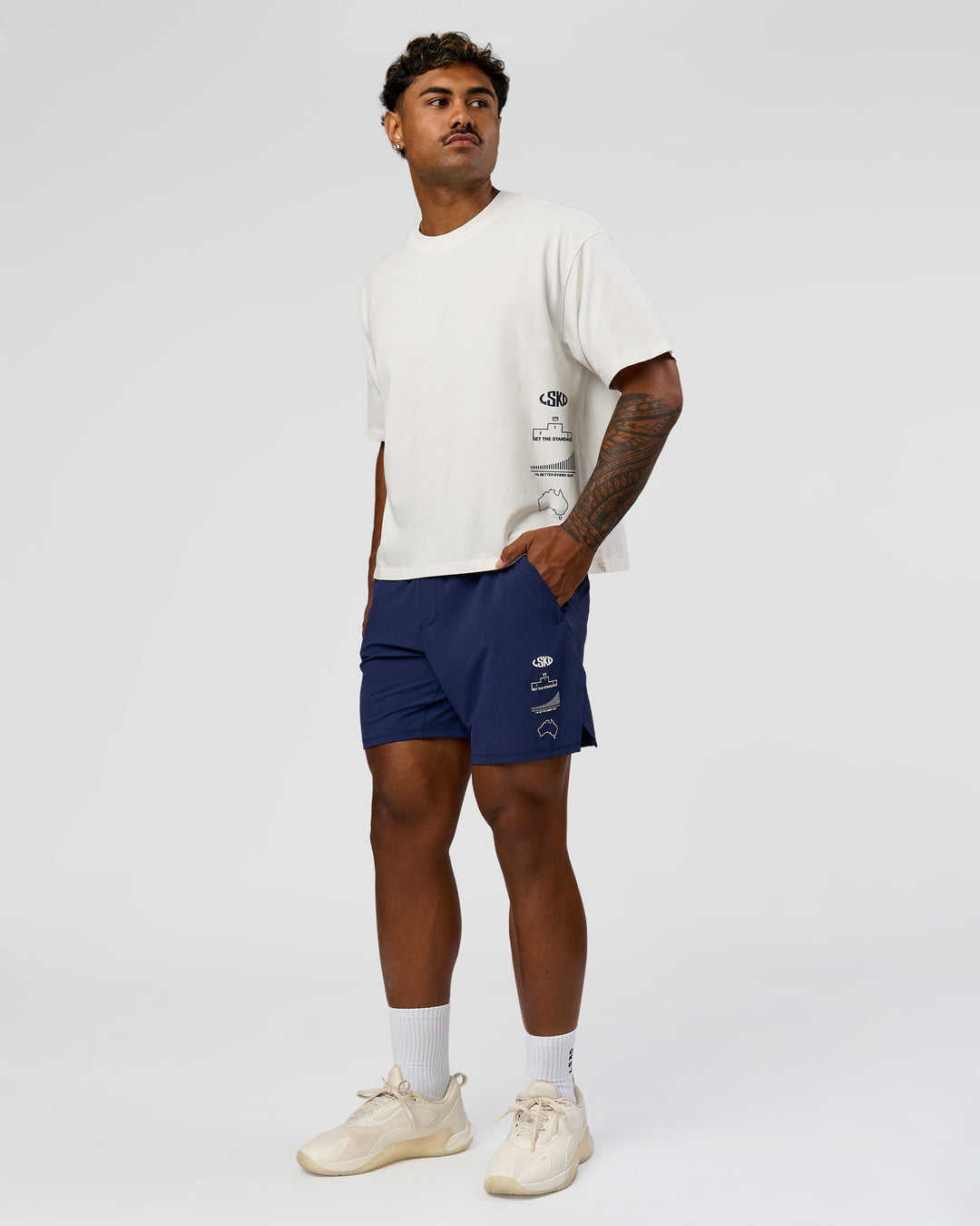 Man wearing Greatest of All Time Heavyweight FLXCotton Boxed Tee - Off White Washed | Model:Xav | Size:L - view 9