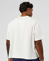 Man wearing Greatest of All Time Heavyweight FLXCotton Boxed Tee - Off White Washed | Model:Xav | Size:L | Thumbnail Index: 9
