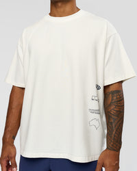Man wearing Greatest of All Time Heavyweight FLXCotton Oversized Tee - Off White Washed-Scarlet | Model:Xav | Size:L | Thumbnail Index: 4