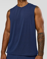Man wearing Greatest of All Time Rep Muscle Training Tank - Future Navy-White | Model:Xav | Size:L | Thumbnail Index: 6