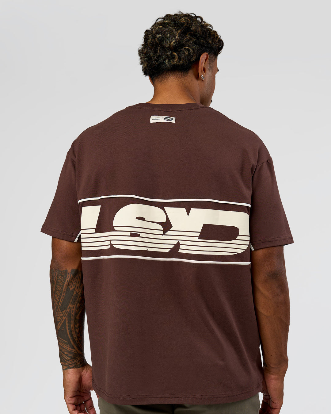 Man wearing Inline Heavyweight FLXCotton Oversized Tee - Hot Chocolate-Off White | Model:Xav | Size:L - view 2