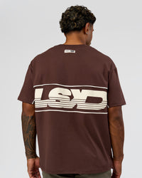 Man wearing Inline Heavyweight FLXCotton Oversized Tee - Hot Chocolate-Off White | Model:Xav | Size:L | Thumbnail Index: 1