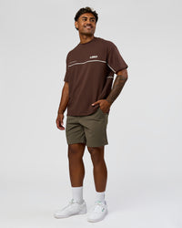 Man wearing Inline Heavyweight FLXCotton Oversized Tee - Hot Chocolate-Off White | Model:Xav | Size:L | Thumbnail Index: 8