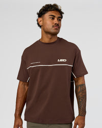 Man wearing Inline Heavyweight FLXCotton Oversized Tee - Hot Chocolate-Off White | Model:Xav | Size:L | Thumbnail Index: 13