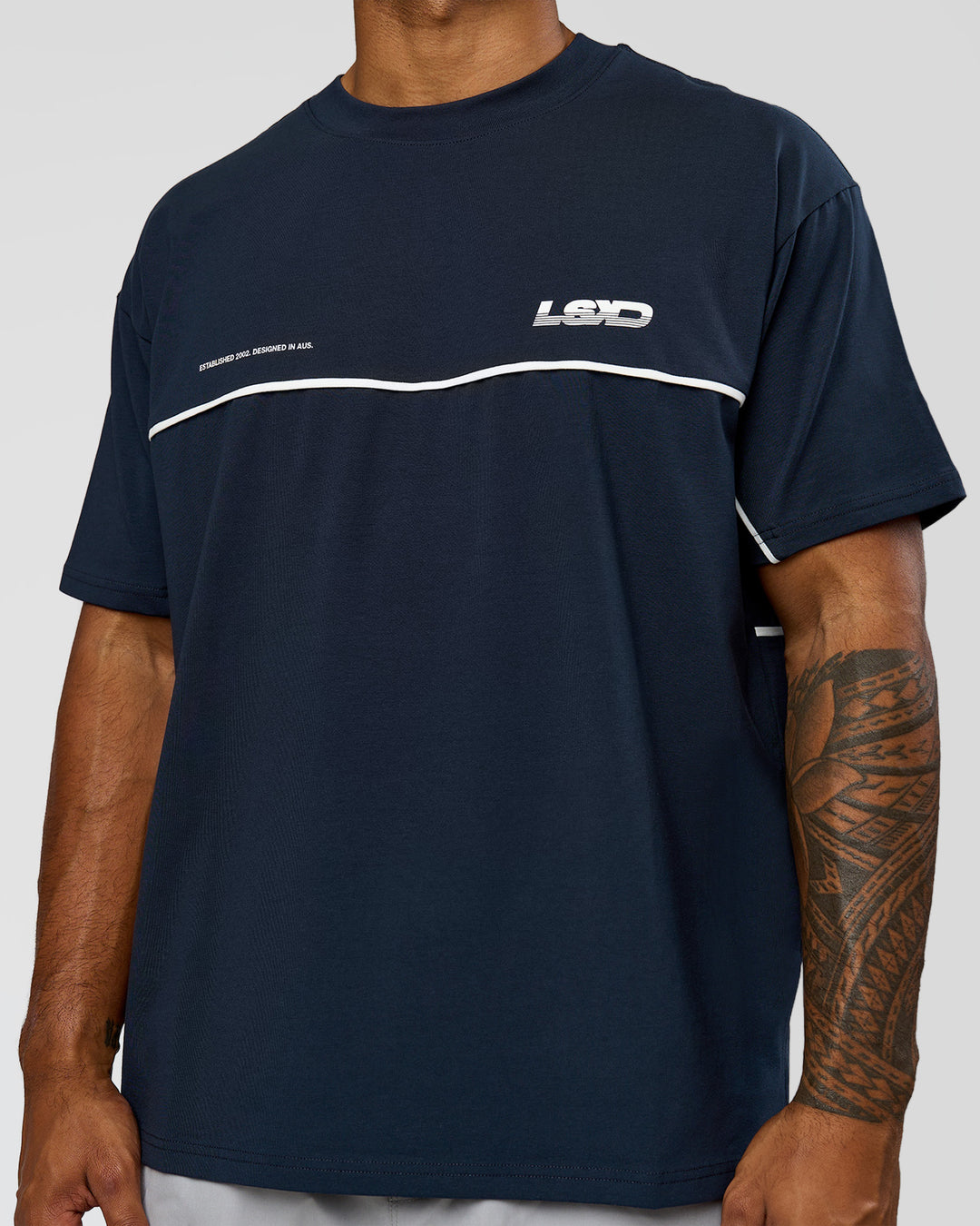 Man wearing Inline Heavyweight FLXCotton Oversized Tee - Midnight Navy-White | Model:Xav | Size:L - view 6