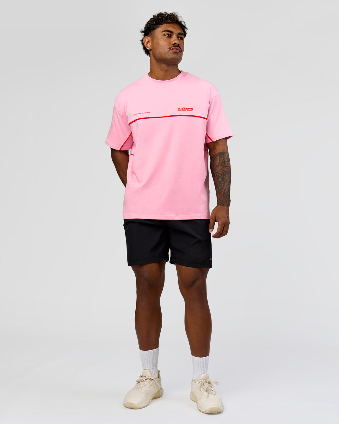 Man wearing Inline Heavyweight FLXCotton Oversized Tee - Pink Rose-Flame | Model:Xav | Size:L - view 8