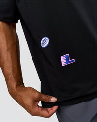 Man wearing League Heavyweight FLXCotton Oversized Tee - Black-Power Cobalt | Model:Xav | Size:L | Thumbnail Index: 2