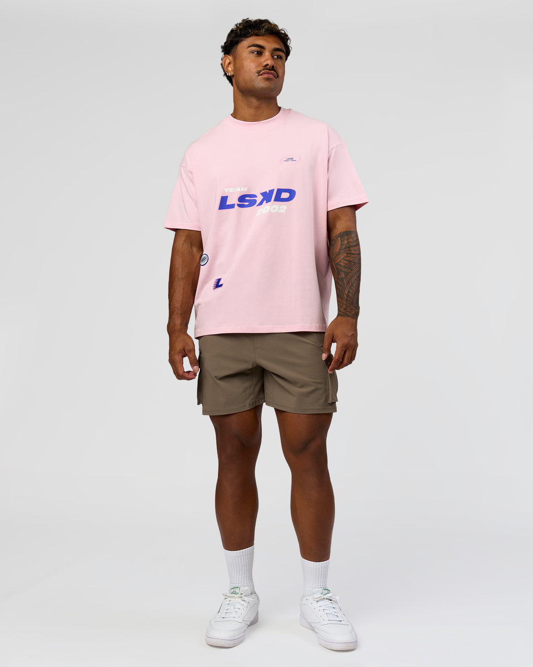 Man wearing League Heavyweight FLXCotton Oversized Tee - Marshmallow-Power Cobalt | Model:Xav | Size:L - view 12