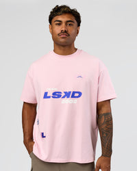 Man wearing League Heavyweight FLXCotton Oversized Tee - Marshmallow-Power Cobalt | Model:Xav | Size:L | Thumbnail Index: 1