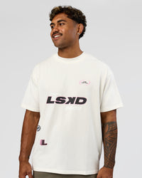 Man wearing League Heavyweight FLXCotton Oversized Tee - Off White-Ground Coffee | Model:Xav | Size:L | Thumbnail Index: 1