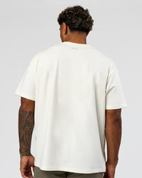 Man wearing League Heavyweight FLXCotton Oversized Tee - Off White-Ground Coffee | Model:Xav | Size:L | Thumbnail Index: 4