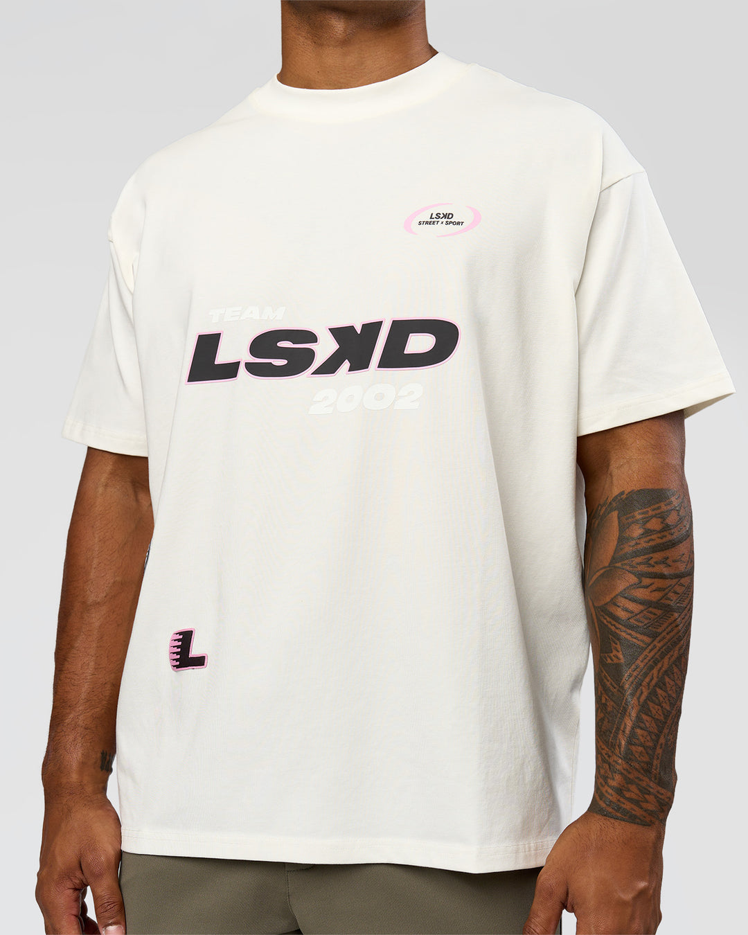 Man wearing League Heavyweight FLXCotton Oversized Tee - Off White-Ground Coffee | Model:Xav | Size:L - view 8