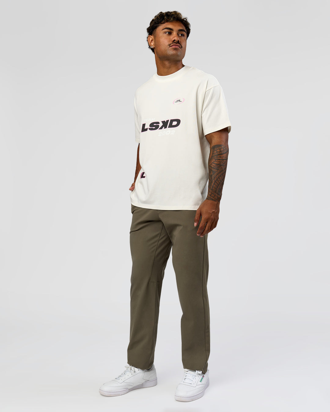 Man wearing League Heavyweight FLXCotton Oversized Tee - Off White-Ground Coffee | Model:Xav | Size:L - view 10