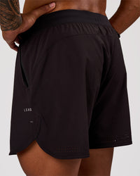 Man wearing Lift 6" Short - Black-Reflective | Model:Xav | Size:L | Thumbnail Index: 0