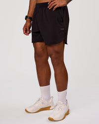 Man wearing Lift 6" Short - Black-Reflective | Model:Xav | Size:L | Thumbnail Index: 4