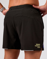 Man wearing Pace 5" Lined Running Short - Game Plan Black | Model:Xav | Size:L | Thumbnail Index: 3