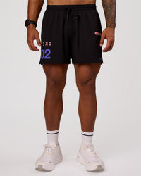 Man wearing Pace 5" Lined Running Short - Game Plan Black | Model:Xav | Size:L | Thumbnail Index: 9
