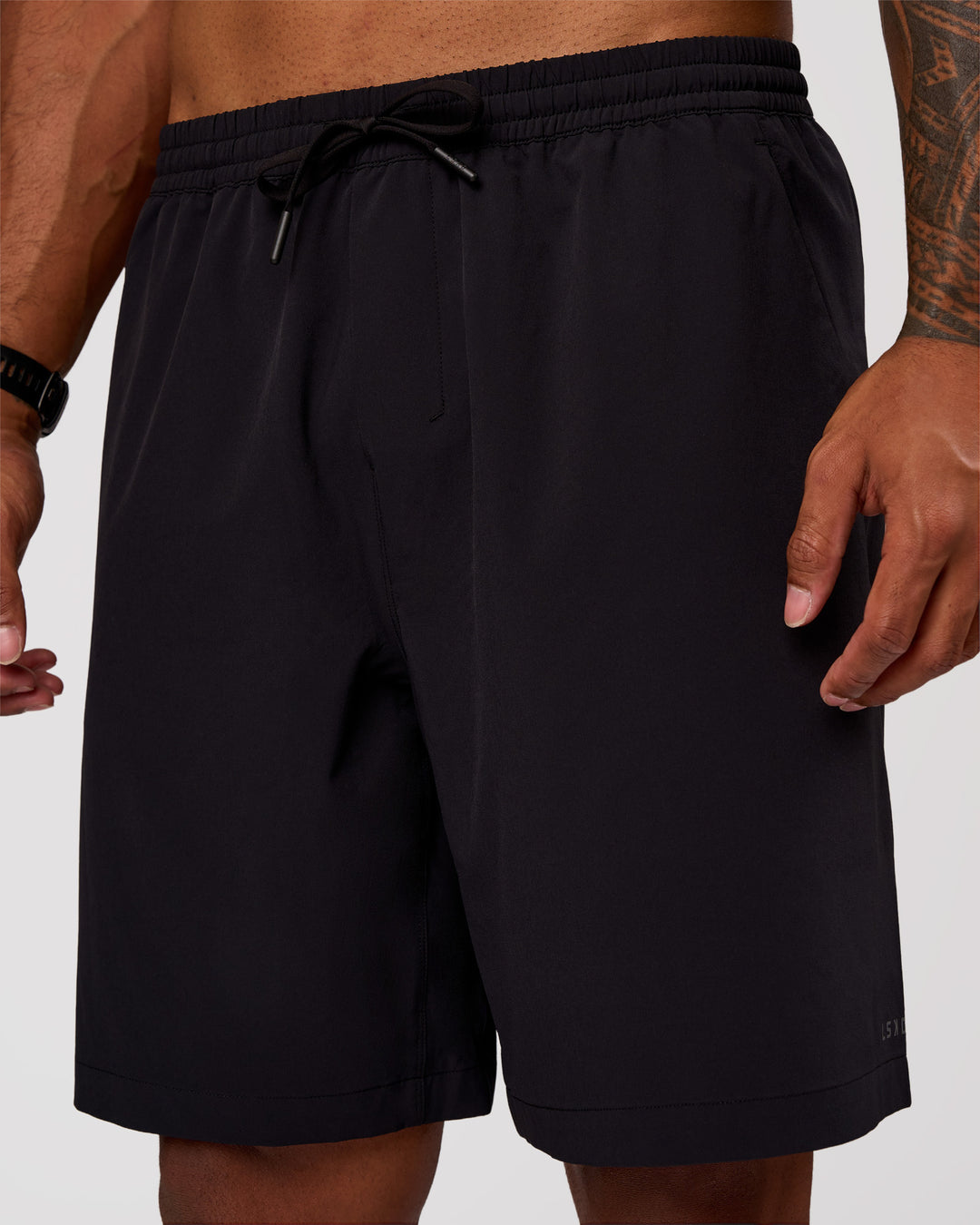Man wearing Rep Movement 9" Training Short - Black | Model:Xav | Size:L - view 2
