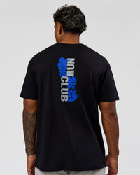 Man wearing Run Club Elevate FLXCotton Oversized Tee - Black-Electric Indigo | Model:Xav | Size:L | Thumbnail Index: 2