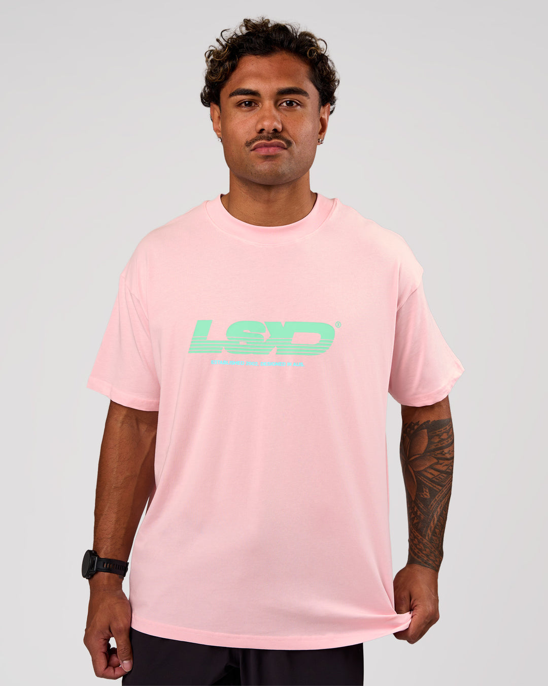 Man wearing Sideline FLXCotton Oversized Tee - Marshmallow-Jelly Mint | Model:Xav | Size:L - view 4