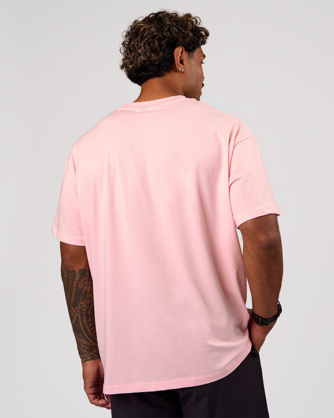 Man wearing Sideline FLXCotton Oversized Tee - Marshmallow-Jelly Mint | Model:Xav | Size:L - view 7