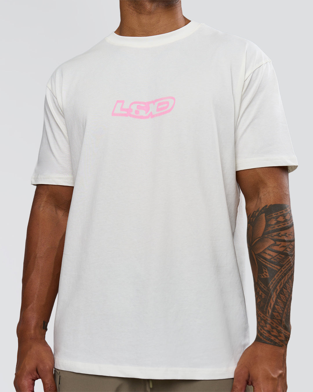 Man wearing SoCal 26 FLXCotton Oversize Tee  - Off White-Pink Rose | Model:Xav | Size:L - view 8