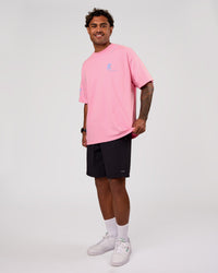 Man wearing Values Manifesto Heavyweight Oversized Tee  - Pink Rose-Open Air | Model:Xav | Size:L | Thumbnail Index: 8