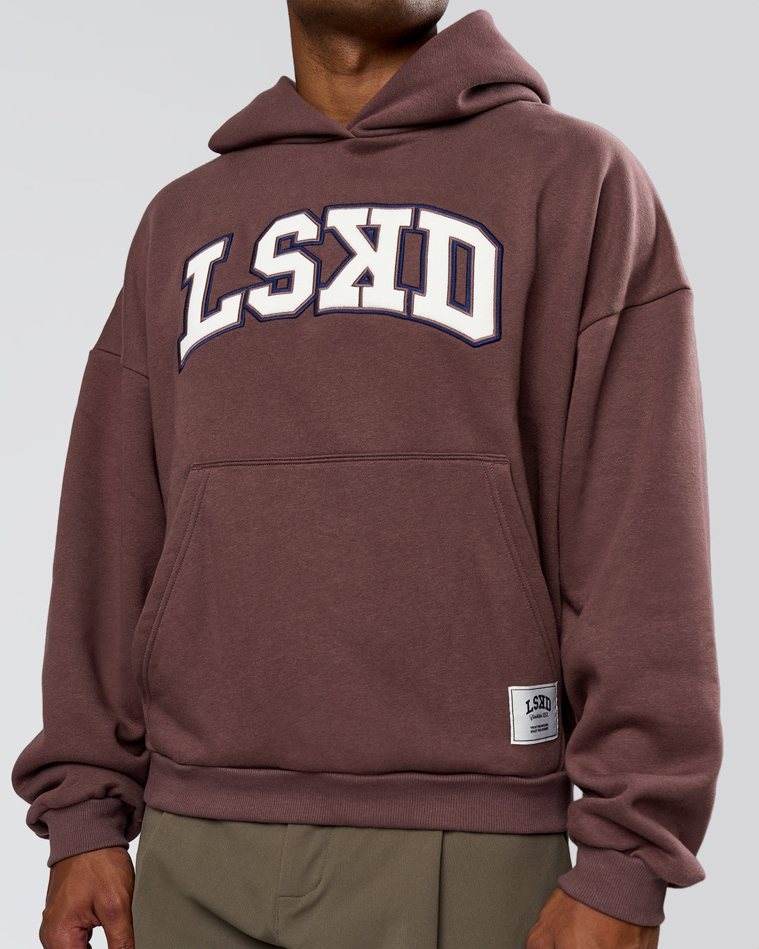 Man wearing Varsity Boxy Hoodie - Cocoa Powder-Off White | Model:Xav | Size:L - view 10