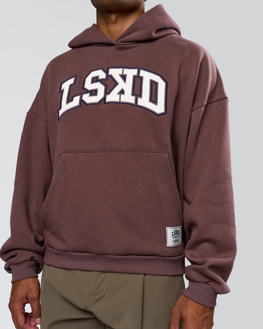 Man wearing Varsity Boxy Hoodie - Cocoa Powder-Off White | Model:Xav | Size:L - view 12
