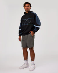 Man wearing Vibe Oversized Hoodie - Black-Future Navy | Model:Xav | Size:L | Thumbnail Index: 8