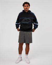 Man wearing Vibe Oversized Hoodie - Black-Future Navy | Model:Xav | Size:L | Thumbnail Index: 10