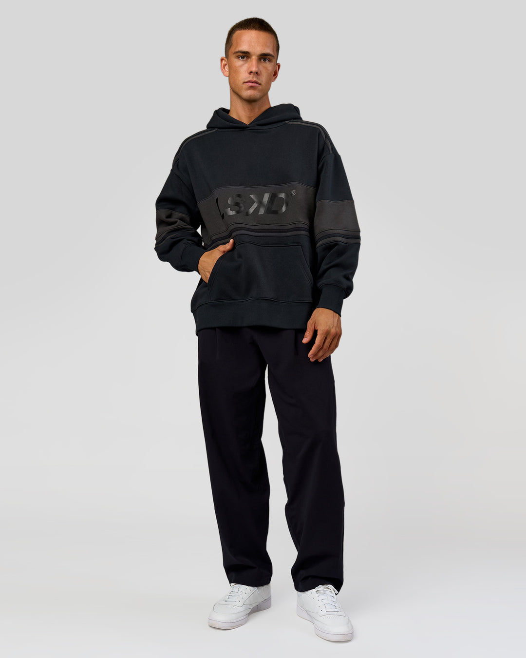 Man wearing A-Team Oversized Hoodie - Caviar-Onyx | Model:Albert | Size:M - view 9