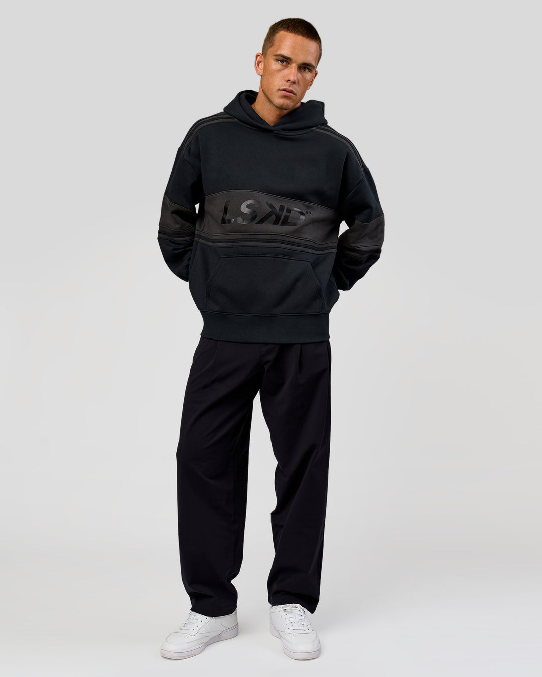 Man wearing A-Team Oversized Hoodie - Caviar-Onyx | Model:Albert | Size:M - view 11