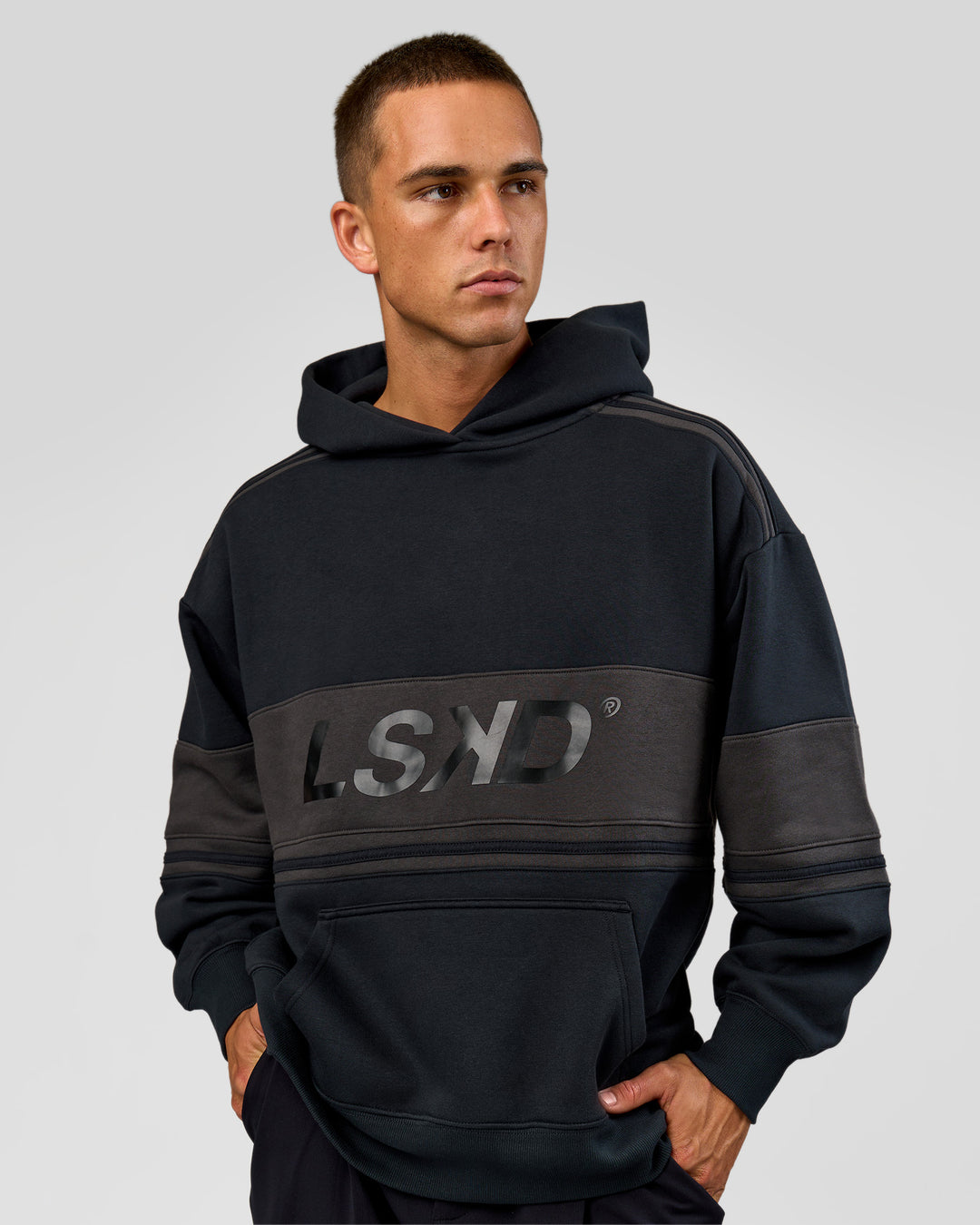 Man wearing A-Team Oversized Hoodie - Caviar-Onyx | Model:Albert | Size:M - view 4