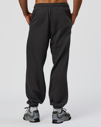 Man wearing Base Baggy Cuffed Track Pant - Onyx | Model:Albert | Size:M | Thumbnail Index: 3